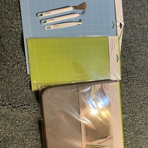 Cricut cut boards iron on pad picking tools and a smaller cut board